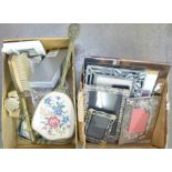 Two boxes of assorted items including photo frames
