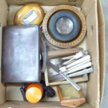 A box of assorted items including a photographers dark room light, small leather case, treen, plated