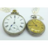 A pocket watch and a silver fob watch