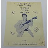 An Elvis Presley shop display card, 1956