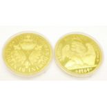 Two sterling silver gilt coins, 74.2g