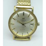 A 9ct gold Tissot automatic wristwatch, the case back bears inscription dated 1977