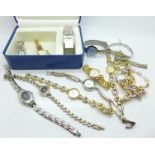 A collection of lady's wristwatches including Rotary and a Rotary watch box