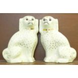 A pair of Staffordshire spaniels with glass eyes, 35cm, a/f