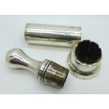 A silver shaving soap holder and a silver mounted brush