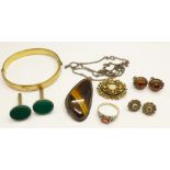 A tigers eye set pendant/brooch on a silver chain, a silver ring, two pairs of earrings, a plated