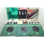 A collection of sixteen 45rpm 7" singles, mainly Beatles including one German made import