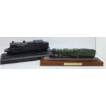 A Lilliput Lane model Flying Scotsman and a carved coal model railway engine