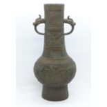 A Japanese bronze vase, 23cm
