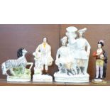 Four Staffordshire flatback figures including Robin Hood and Robert Burns