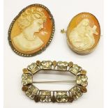 Two cameo brooches and a brooch adapted from a Georgian buckle