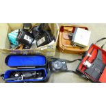 A box of mixed cameras, cine cameras and a boxed converter