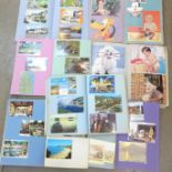 Seven scrap and postcards albums