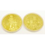 Two sterling silver gilt coins, 73.4g