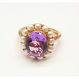 A silver gilt, amethyst and pearl cluster ring, O