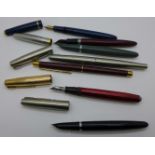 A Parker and a Sheaffer pen with 14k gold nibs and five other pens