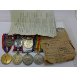 A WWI Victory medal to Pte. J.J. Flack, Hartigans Hse., and six WWII medals