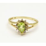 A 9ct gold, diamond and peridot ring, 1.2g, O