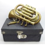 A miniature brass trumpet