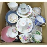 A collection of cups and saucers including Royal Crown Derby and Wedgwood