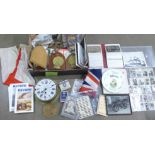 A box of Naval memorabilia, flags, boatswain pipes, badges, cigarette cards, postcards, Smiths clock