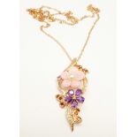 A silver gilt, carved pink pearl, Russian diopside, amethyst and tanzanite pendant