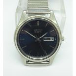 A stainless steel Seiko quartz wristwatch