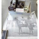 Assorted items including a Bell & Howell 8mm camera, a pair of folding leather mounted coloured