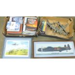 A woolwork picture of a Lancaster bomber, three model aeroplanes (assembled Airfix kits), a RAF