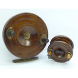 Two wooden fishing reels, one marked Eton Sun