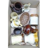 A collection of salt glaze and other relief moulded jugs, mugs, jelly mould, etc., 19th Century