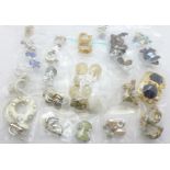 Twenty pairs of clip-on earrings