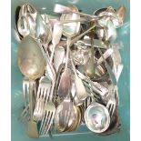 A collection of silver plated flatware