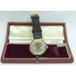 A 9ct gold cased Garrard automatic wristwatch, with box