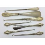 Silver handled button hooks and shoe horns