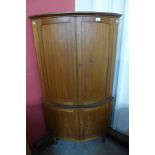 A Danish teak four door corner cabinet