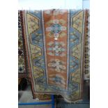 An eastern geometric patterned rug