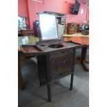 A George III carved mahogany night stand