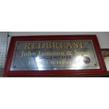 A large advertising mirror, bearing painted Redbreast, John Jameson & Son's, Irish Whiskey