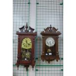 An oak wall clock and one other