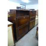 A pair of walnut bookcases