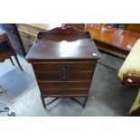 An Edward VII mahogany music cabinet