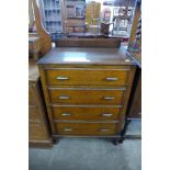 An oak chest of drawers