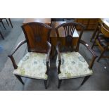 A pair of Edward VII Adams style mahogany elbow chairs