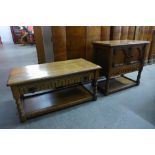 A small carved oak two door cupboard and a matching single drawer coffee table