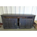 A Victorian carved oak church cupboard