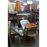 A beech standard lamp, mahogany nest of tables, brass topped occasional table, occasional table,