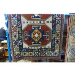 An eastern geometric patterned rug