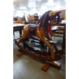 An Ian Armstrong carved hardwood rocking horse