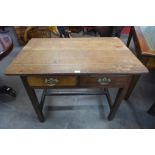 A George III oak two drawer side table
